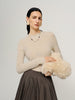 Woman wearing beige cashmere