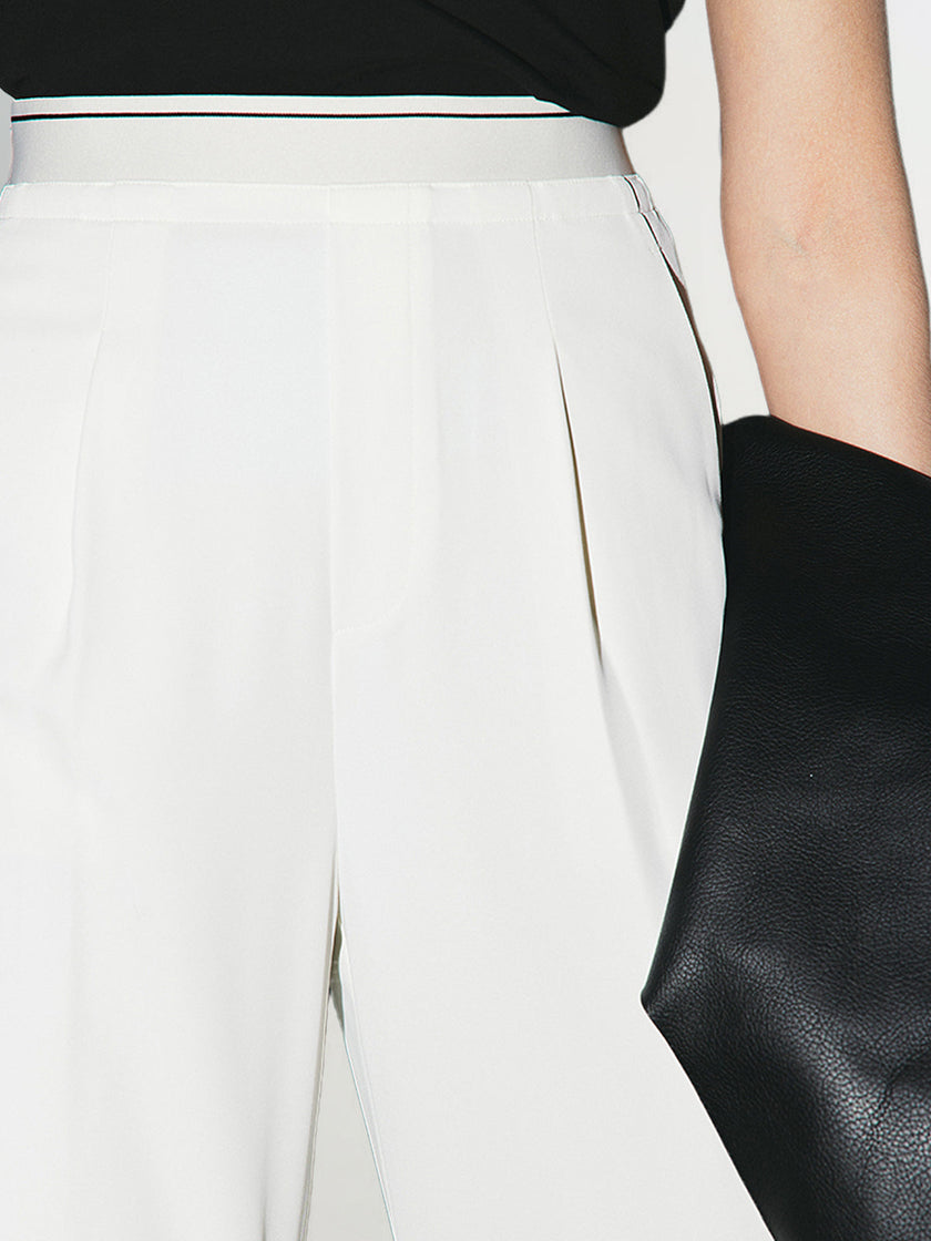 White flowing pants