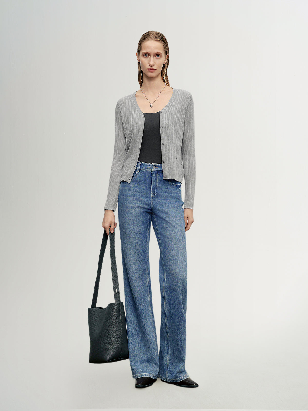 MEILLEUR MOMENT Indigo Blue Flared Jeans - On Model Styled with Gray Thin Cardigan