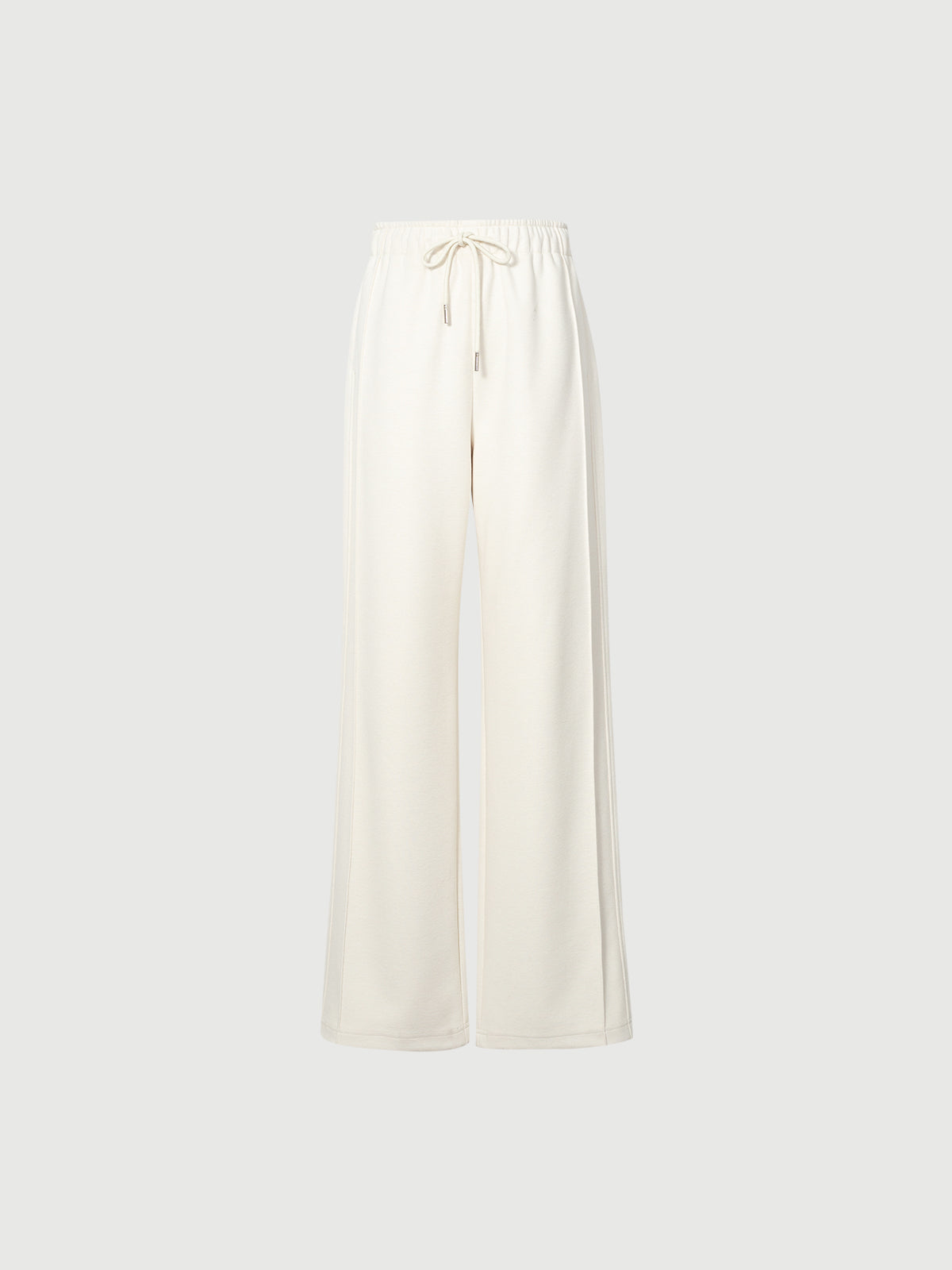 White wide-leg pants on a light gray background