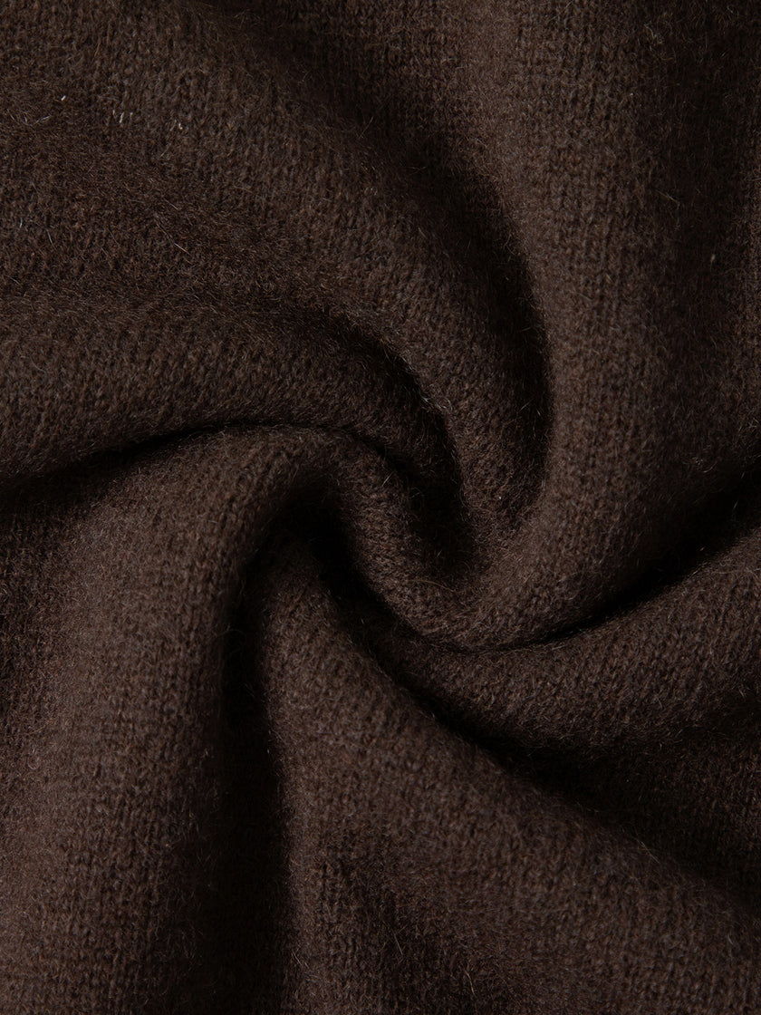 Close-up of brown fabric with a textured pattern