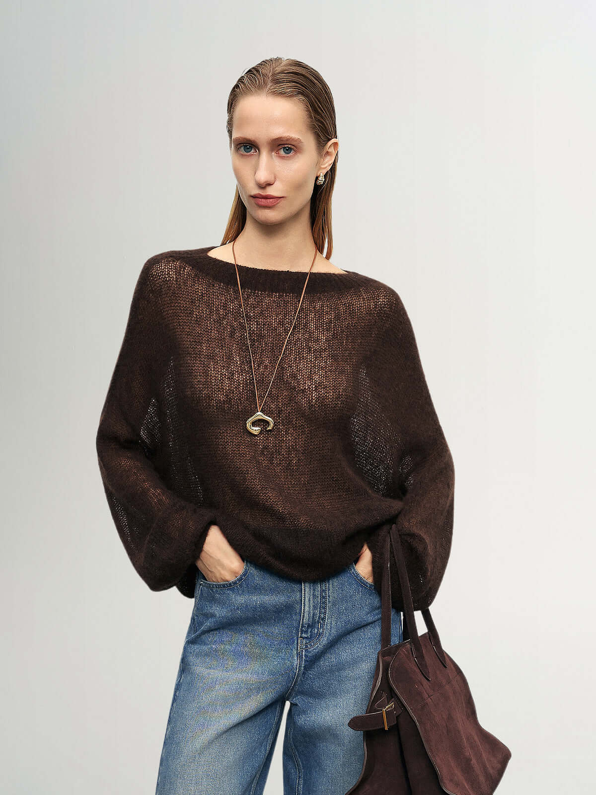 Cashmere-Silk Relaxed Pullover Sweater in dark brown with dropped shoulders, paired with denim and accessories.
