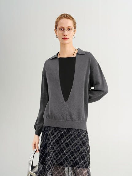 Blusa de malha com decote em V profundo e manga comprida
