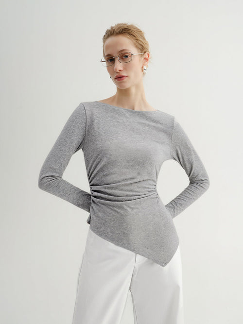 Load image 1 in gallery view. Woman wearing a gray sweater with a white background