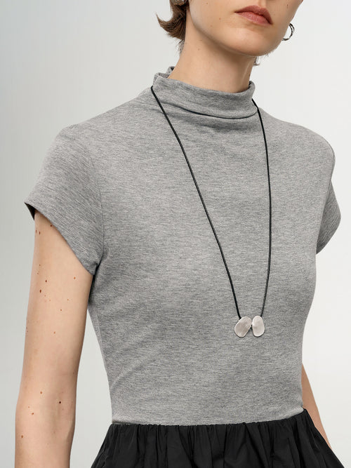 Load image 1 in gallery view. Lyocell Structured Shoulder Mock Neck Short Sleeve Top