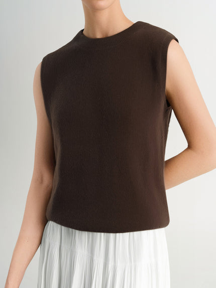 Brown sleeveless top worn by a person on a light gray background