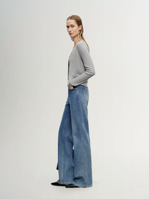 Load image 1 in gallery view. MEILLEUR MOMENT Indigo Blue Flared Jeans - Side View