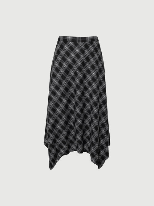 Load image 1 in gallery view. Plaid skirt on a light gray background