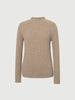 Beige ribbed sweater on a light gray background