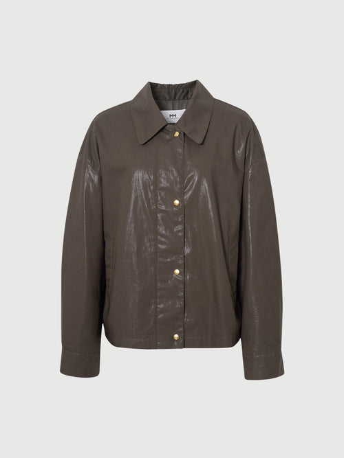 Load image 1 in gallery view. Brown leather jacket on a light gray background