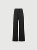 Black wide-leg pants on a light gray background