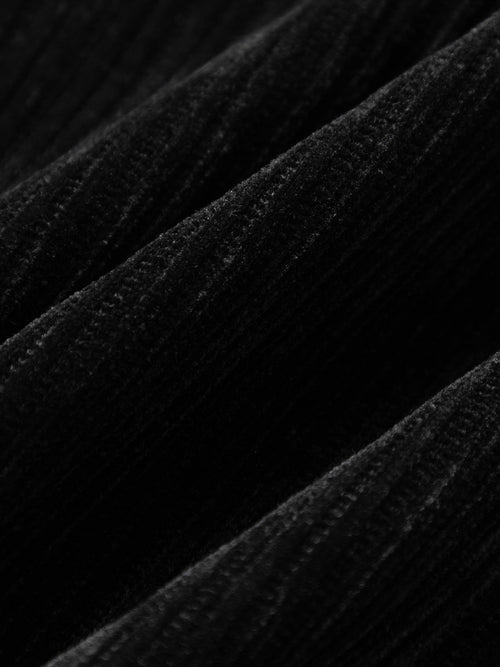 Load image 1 in gallery view. Close-up of textured black fabric with a dark background