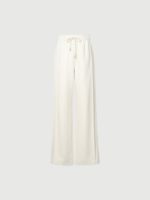Load image 1 in gallery view. White wide-leg pants on a light gray background