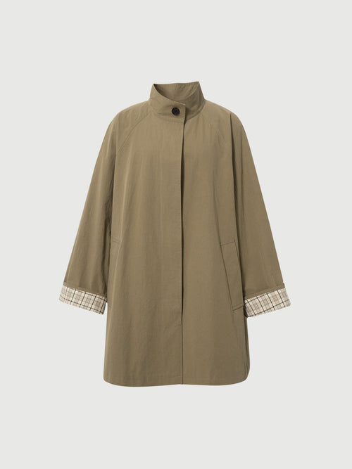 Load image 1 in gallery view. Brown coat with plaid cuffs on a light gray background