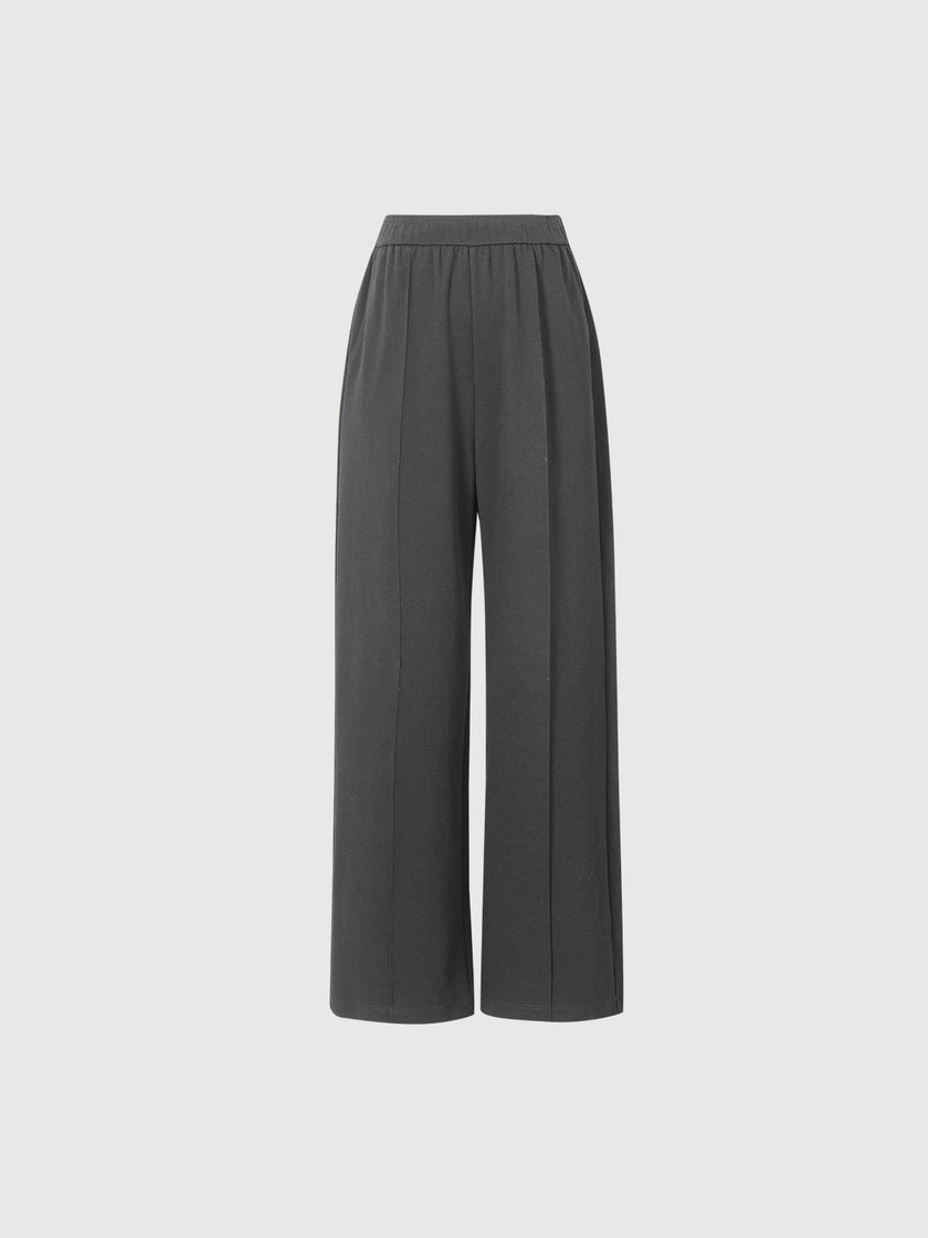 Dark gray wide-leg pants on a light gray background