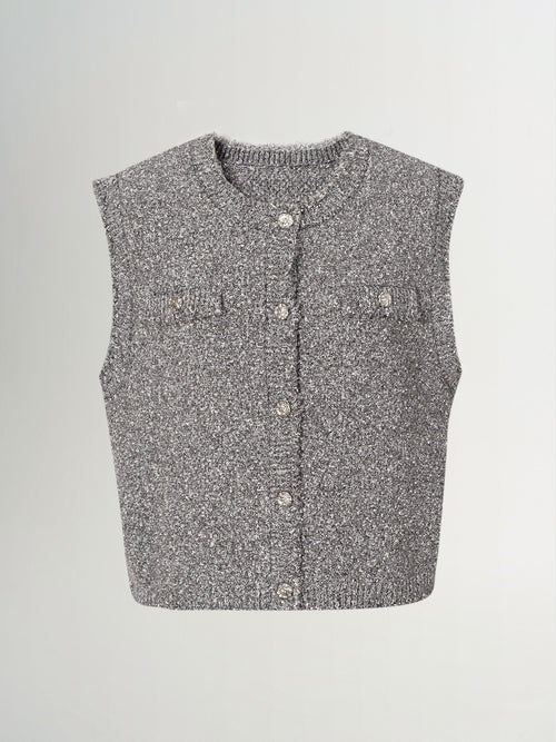 Load image 1 in gallery view. Tweed knit vest in gray, featuring button closure and pocket details, perfect for layering and casual wear.
