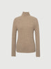 Beige ribbed sweater on a light gray background