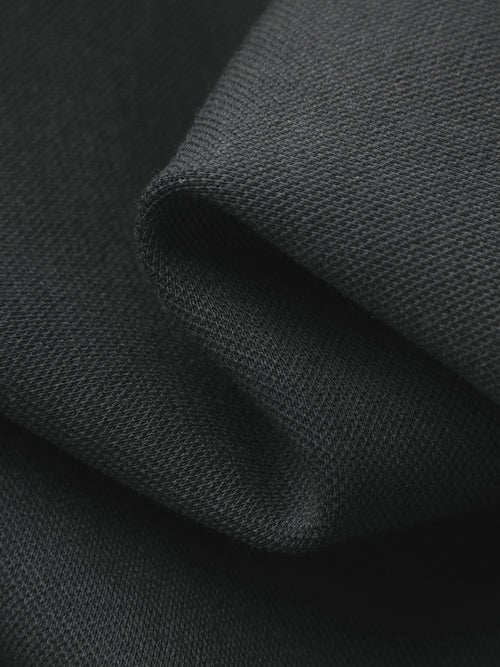 Load image 1 in gallery view. Close-up of dark gray fabric with a textured surface