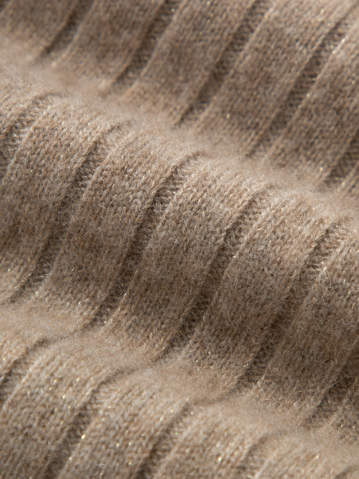 Close-up of textured brown fabric with wavy pattern