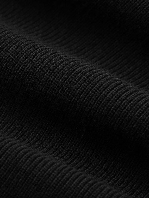 Load image 1 in gallery view. Close-up of black textured fabric