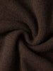 Close-up of brown fabric with a textured pattern