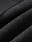Close-up of dark gray fabric with a textured surface