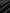 Close-up of dark gray fabric with a textured surface