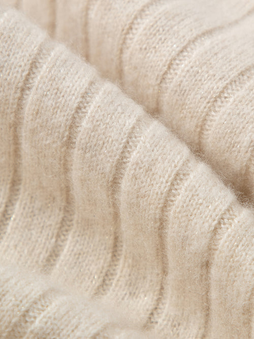 Load image 1 in gallery view. Close-up of beige knitted fabric texture