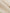 Close-up of beige knitted fabric texture