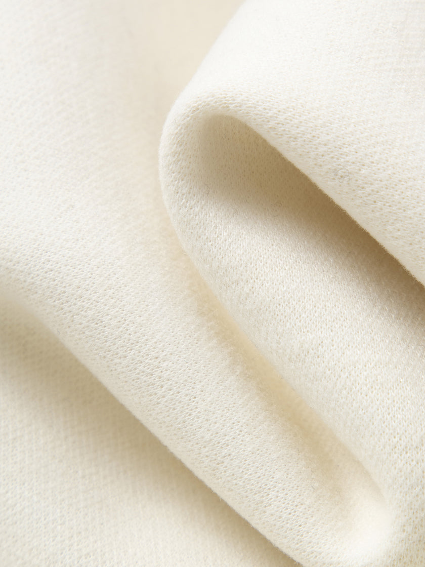 Close-up of beige fabric with a soft texture