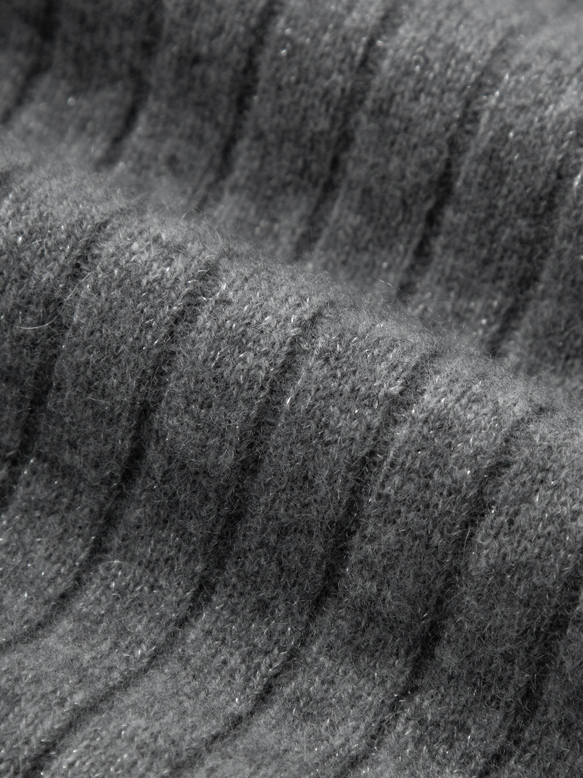 Close-up of textured sand dune surface