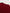 Close-up of a red ribbed sweater collar on a light gray background