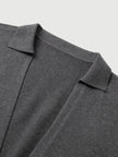 Blusa de malha com decote em V profundo e manga comprida