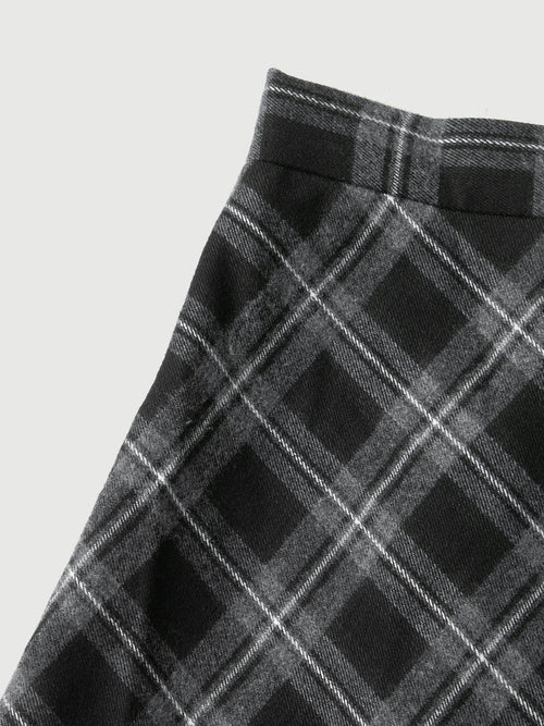 Load image 1 in gallery view. Close-up of a black and gray plaid pattern on a plain background