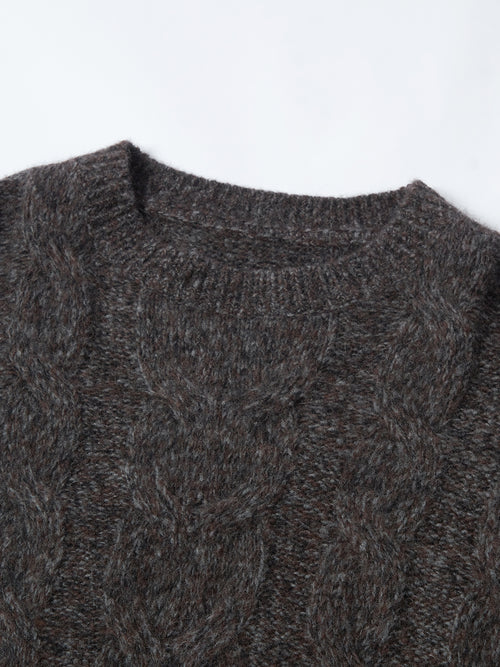 Load image 1 in gallery view. Close-up of a dark gray cable knit sweater on a white background