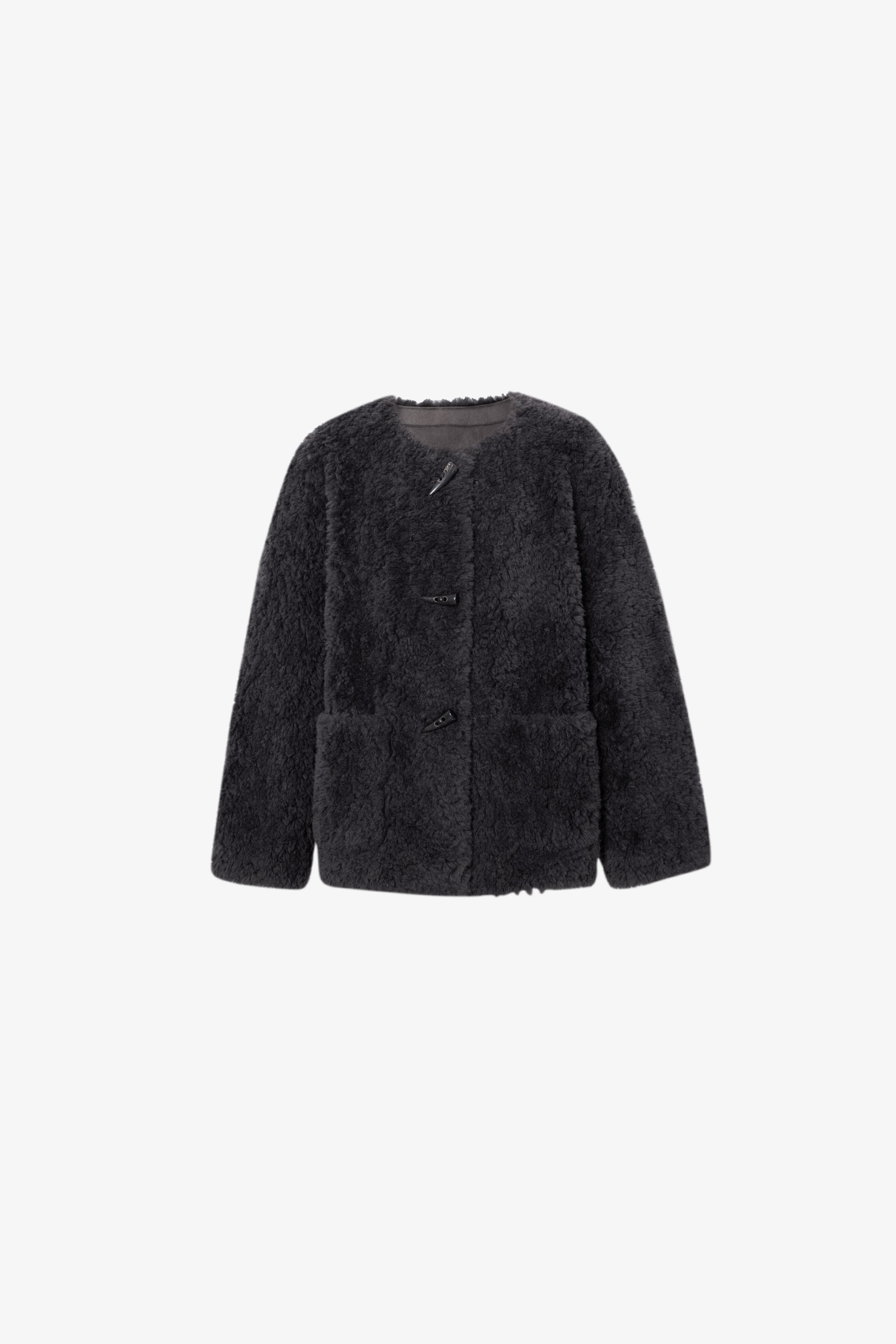 Black fluffy jacket on a white background