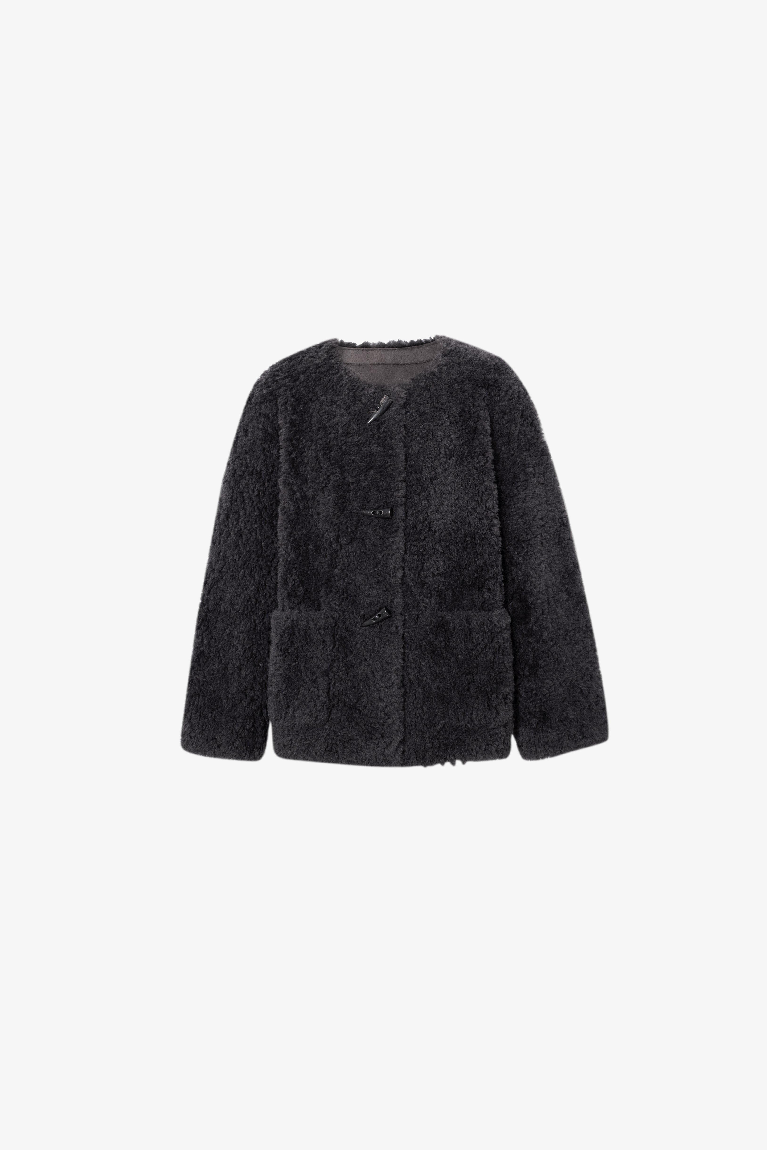 Black fluffy jacket on a white background