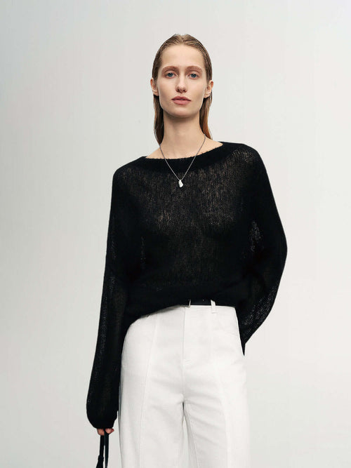 Load image 1 in gallery view. Cashmere-Silk Relaxed Pullover Sweater in black worn by a model, featuring a relaxed fit and elegant style.