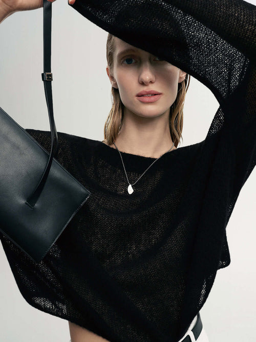 Load image 1 in gallery view. Cashmere-Silk Relaxed Pullover Sweater worn by a model, showcasing its soft, relaxed fit and elegant style.