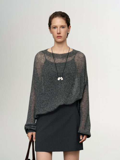 Load image 1 in gallery view. Cashmere-Silk Relaxed Pullover Sweater showcased in light gray, styled with a skirt and accessories for a chic look.
