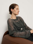Cashmere-Silk Relaxed Pullover Sweater worn by a woman, showcasing soft, elegant style and relaxed fit.
