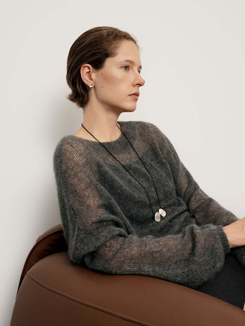Cashmere-Silk Relaxed Pullover Sweater worn by a woman, showcasing soft, elegant style and relaxed fit.
