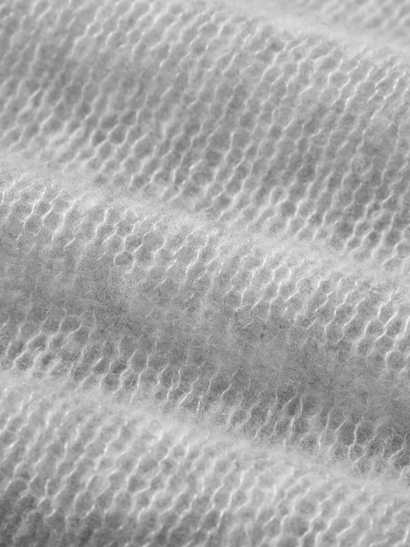 Close-up texture of cashmere and silk blend fabric for Cashmere-Silk Relaxed Pullover Sweater.