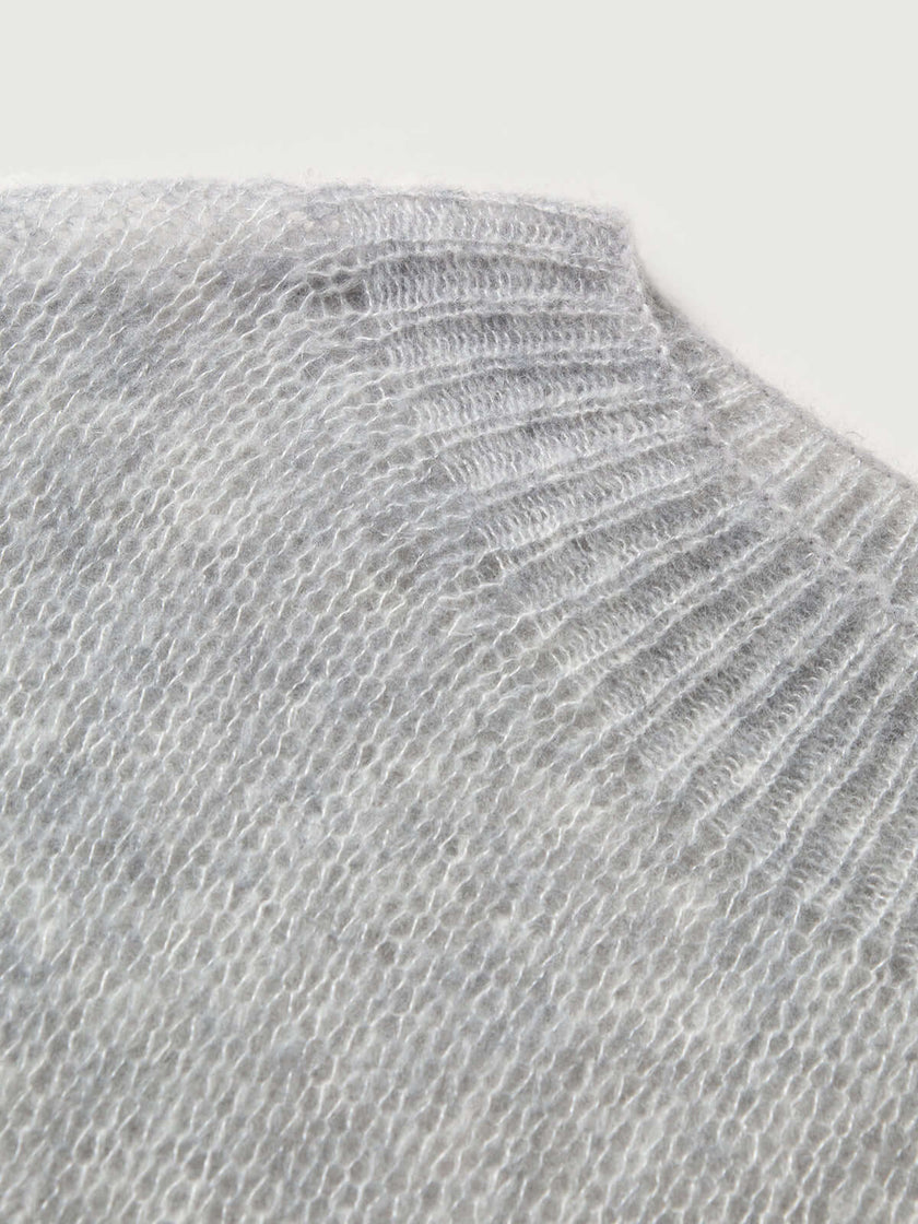 Close-up of the collar of a Cashmere-Silk Relaxed Pullover Sweater in light gray.