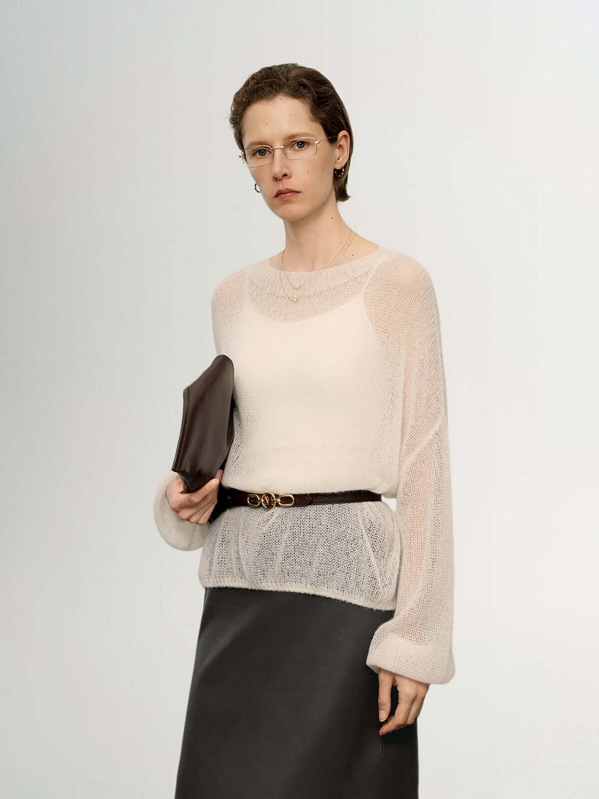 Cashmere-Silk Relaxed Pullover Sweater in soft fabric, styled with a belt and clutch for a chic look.