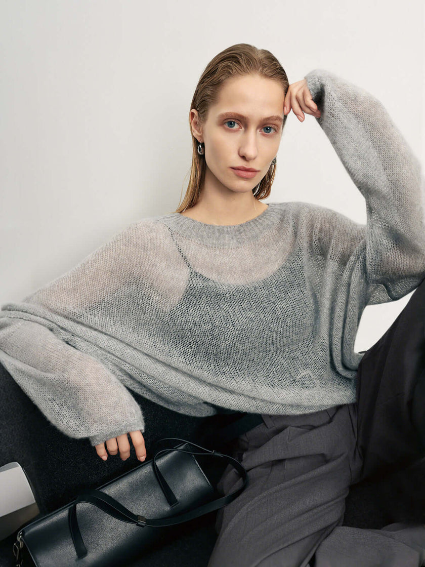 Cashmere-Silk Relaxed Pullover Sweater in light gray, showcasing its soft texture and relaxed fit on a model.