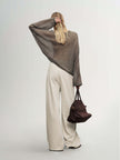 Cashmere-Silk Relaxed Pullover Sweater styled with wide-leg pants and a brown handbag, showcasing a soft, elegant look.