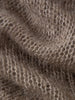 Close-up of soft knit fabric showcasing Cashmere-Silk Relaxed Pullover Sweater texture.
