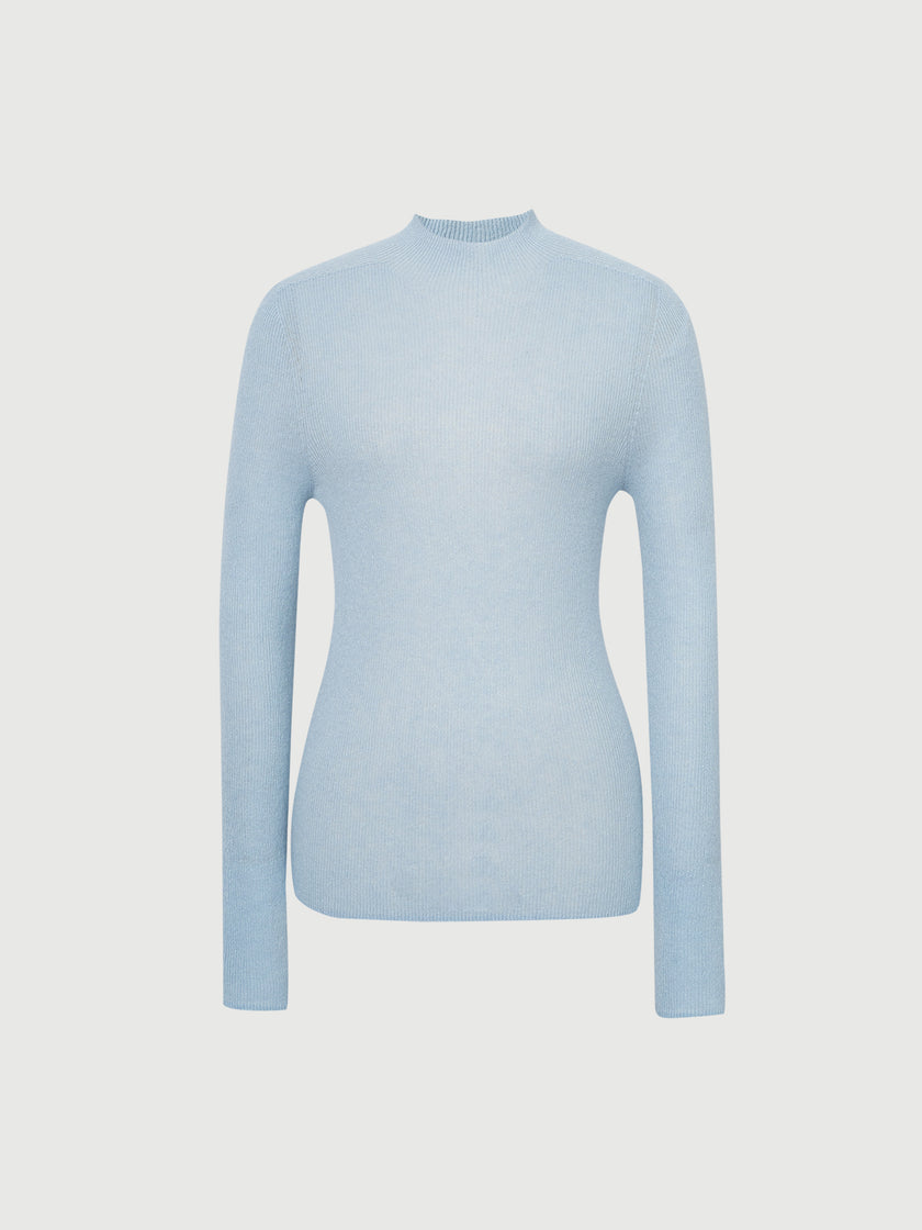 Light blue sweater on a light gray background