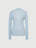 Light blue sweater on a light gray background